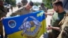 Президент України Володимир Зеленський (праворуч) під час поїздки на Донеччину зустрівся з бійцями Сил спеціальних операцій ЗСУ, 29 липня 2023 року 