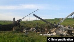 Nagorno-Karabakh - The wreckage of what Karabakh Armenian forces described as an Azerbaijani military helicopter shot down by them, 2Apr2016.