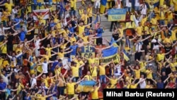 За словами Свіщева, кричалка «Путін – х...о», яка стала традиційною для українських фанатів за час агресії Росії проти України, є образою президента Росії