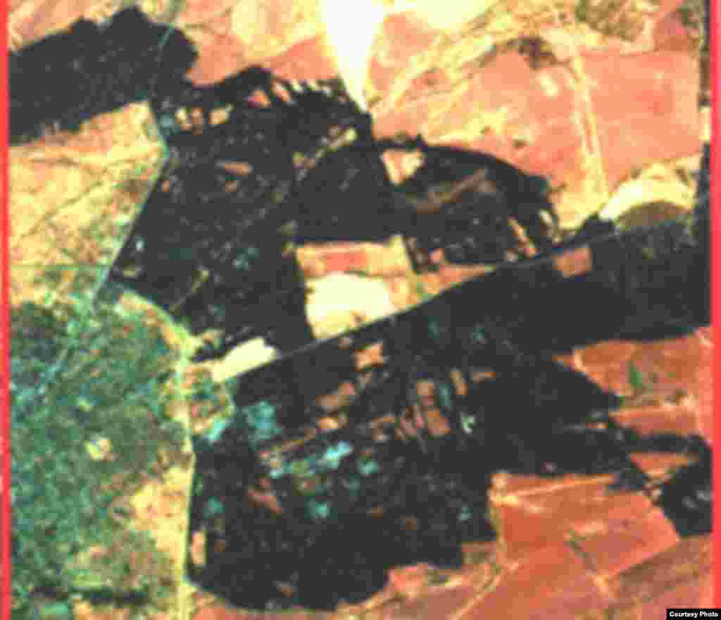Azərbaycanın Xarici İşlər Nazirliyinin yaydığı foto. Nazirlik 2006-cı ildə yaydığı fotolarda rayonun ərazisinin erməni qüvvələri tərəfindən bilərkdən yandırıldığını bildirir. 