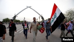 هواداران مقتدی صدر در حال ترک منطقه سبز بغداد