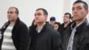 Armenia - Former soldiers Musa Serobian (L) Arayik Zalian (C) and Razmik Sargsian hear the announcement of a court verdict upholding their innocence in a high-profile murder case, Gyumri, 18Dec2012. (Photo courtesy of Asparez.am)