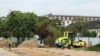 Planșeul Unirii, Bucharest, Romania. Workers are preparing the first construction works on the Unirii Square Unirii Floor