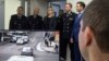 Татьяна Ломакина (от нее слева направо) Вячеслав Аброськин и Вадим Бойченко наблюдают за ходом операции по спасению ребенка