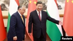 Виктор Орбан жана Си Цзинпин. 2024-жылдын 8-июлу. 