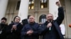 Павал Севярынец, Мікола Статкевіч і Ўладзімер Някляеў на акцыі ў Дзень беларускай вайсковай славы