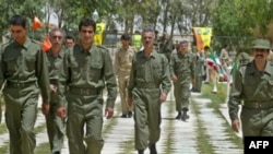 نیروهای سازمان مجاهدین در اردوگاه اشرف (عکس: AFP)